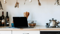 A computer used to find a real estate agent for selling a home.