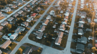 a neighborhood, which may require a realtor to sell or buy a home.